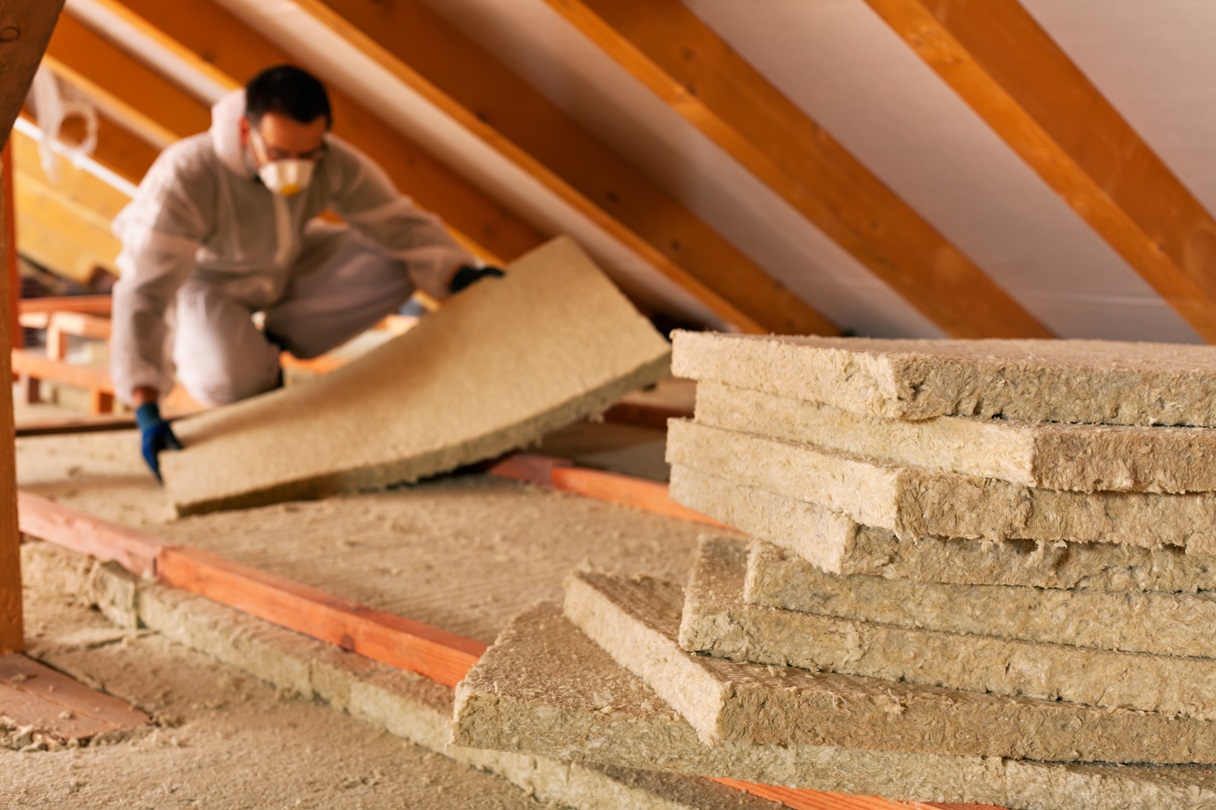 Image of sound proofing insulation sectioned out and laid out to be installed in an attic.