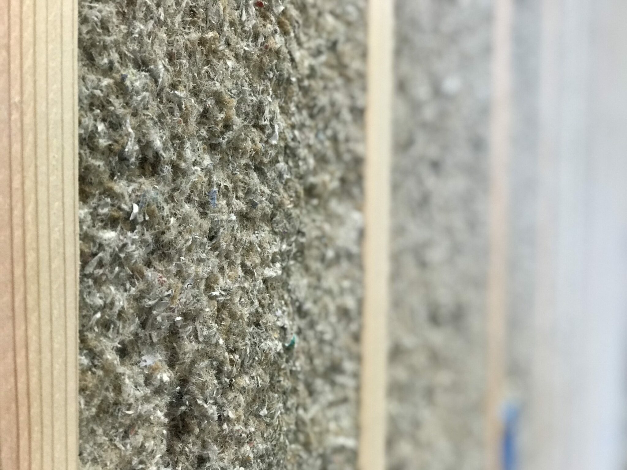 Up close image of blown cellulose insulation.