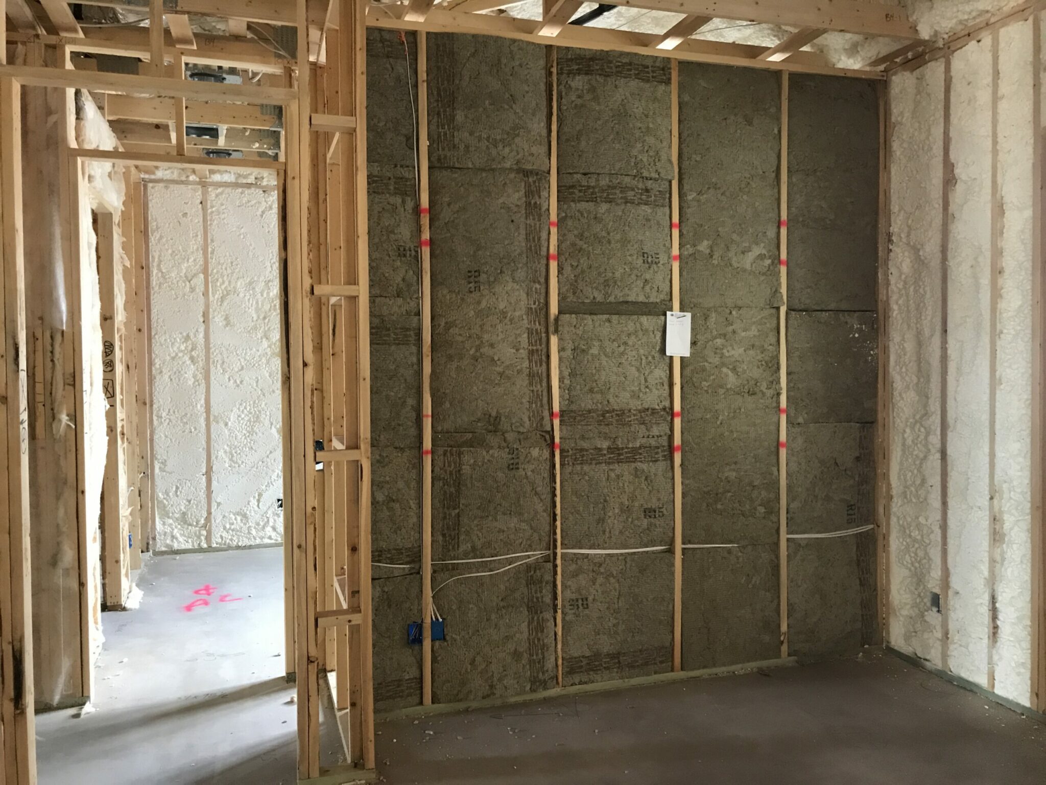 New home installation of spray foam insulation.